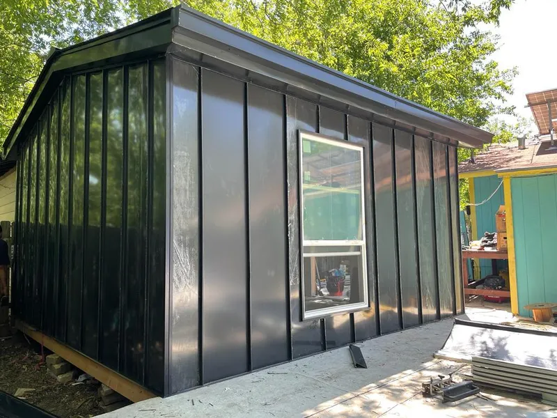 Black standing seam metal wall panels for Metal Roof Installation in Mercer Island